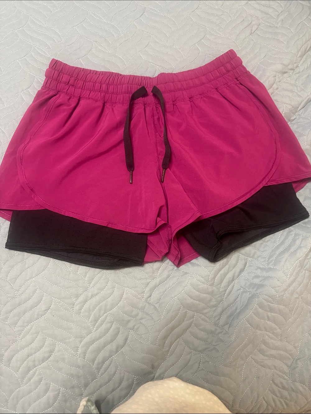 Lululemon Women’s Pink Layered Athletic Shorts side pockets